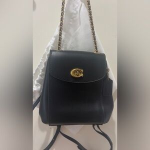 Coach leather backpack with gold chain straps